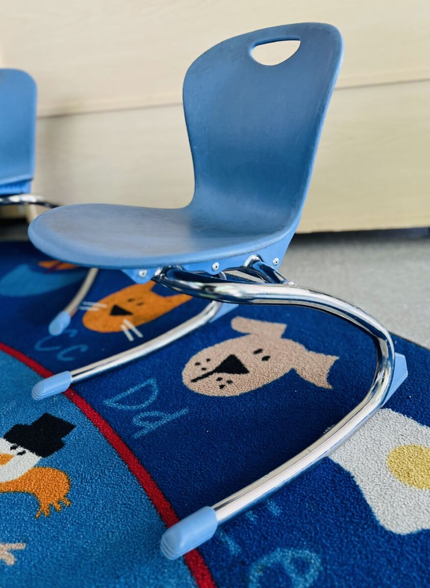 All general education classrooms should have flexible seating supports like this blue rocking chair.