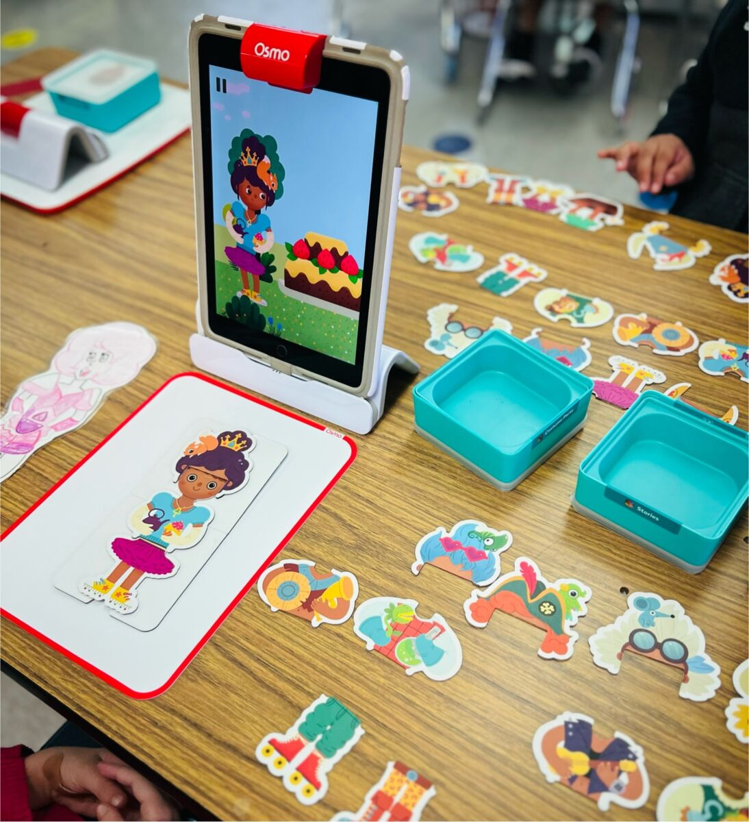 This is a photo of a student using the Osmo Little Genius kit in a special education classroom